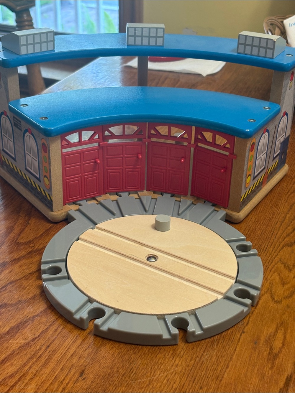 Wooden Toy Train Roundhouse with Red Doors and Blue Roof